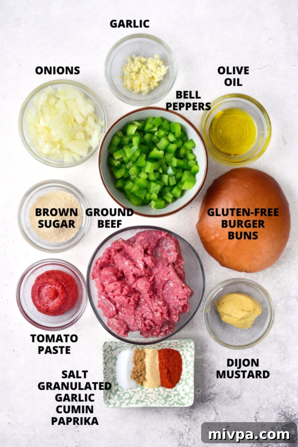 Recipe for Sloppy Joes (Gluten-Free) Top down view of ingredients for gluten-free sloppy joes recipe on white board.