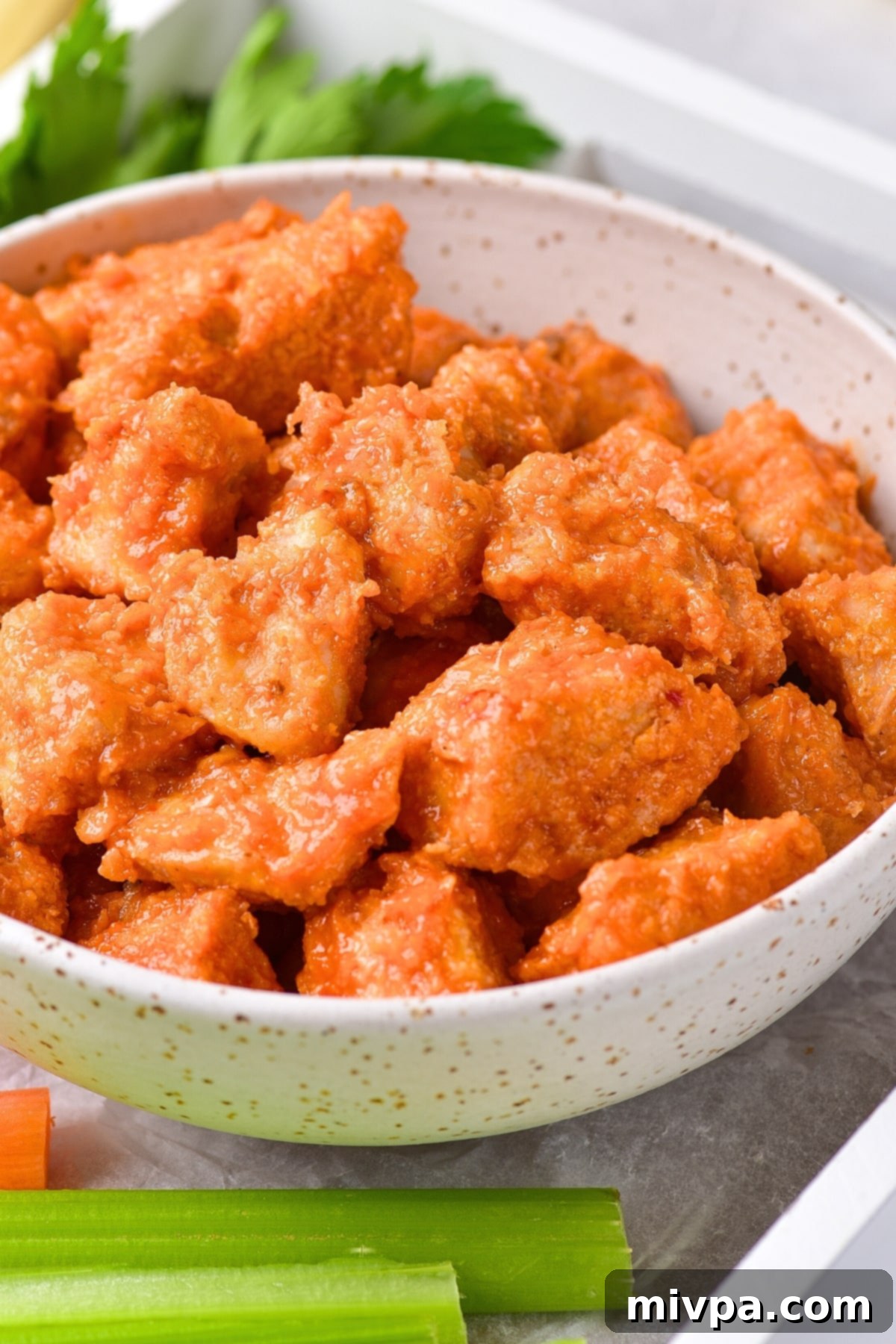 Up close shot of bowl of gluten-free buffalo chicken bites.