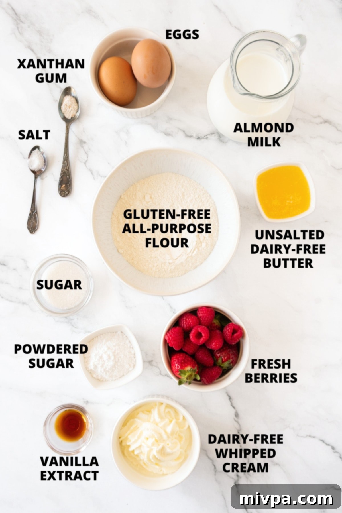 Gluten-Free Crepes Recipe (Dairy-Free) Ingredients for gluten-free crepes recipe laid out on marble board.