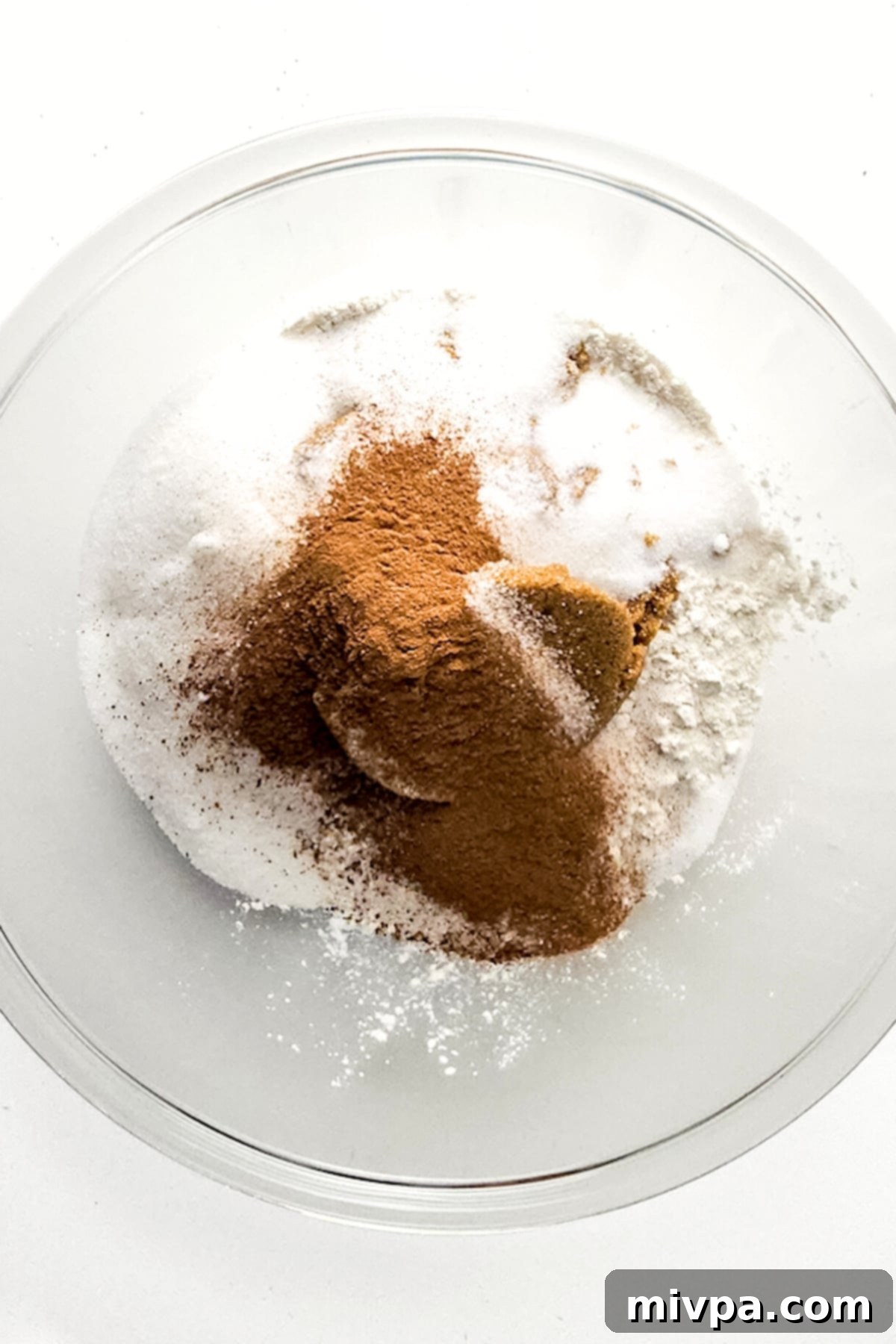 Easy Gluten-Free Carrot Cake (Dairy-Free) Dry ingredients in glass bowl.