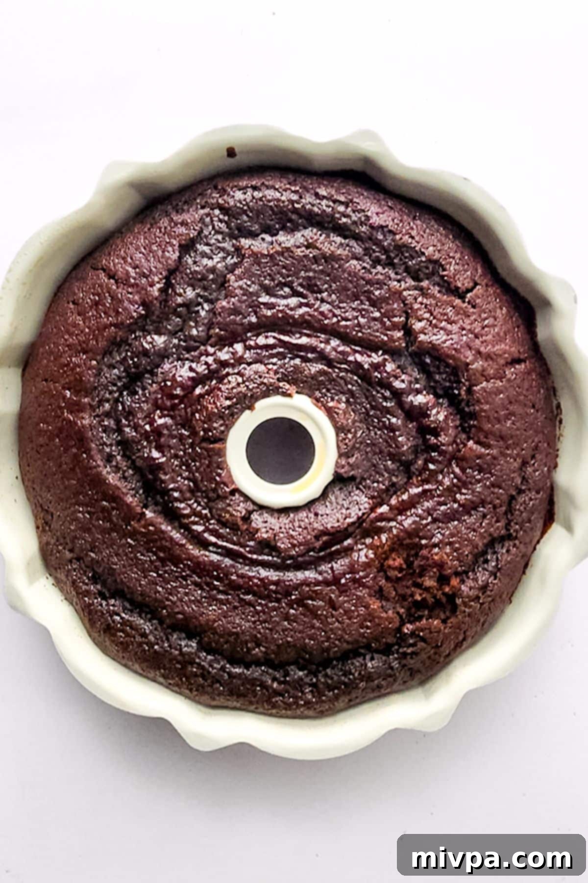 Easy Chocolate Cake (Gluten-Free, Dairy-Free) Freshly baked chocolate cake in pan