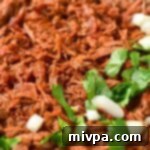 Up close view of Mexican shredded beef.
