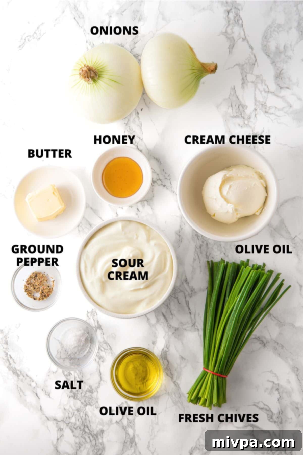 Gluten-Free French Onion Dip Recipe Ingredients for gluten-free French onion dip recipe laid out on marble board.