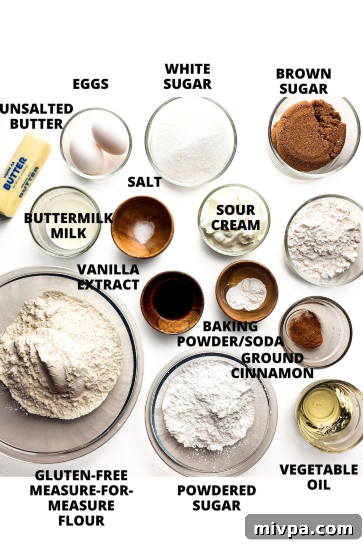 Easy Gluten-Free Crumb Cake Recipe Ingredients All the necessary ingredients for the gluten-free crumb cake recipe meticulously laid out on a clean white board, ready for preparation.