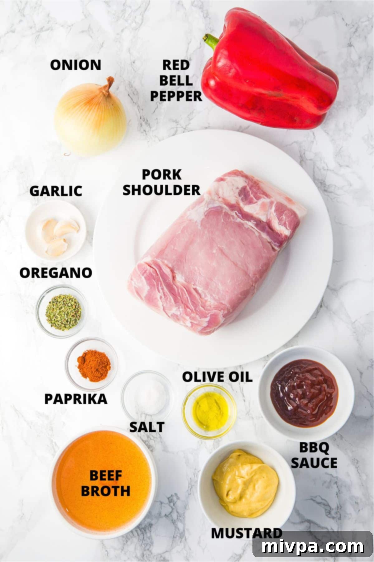 Ingredients for gluten-free pulled pork recipe laid out on marble board.