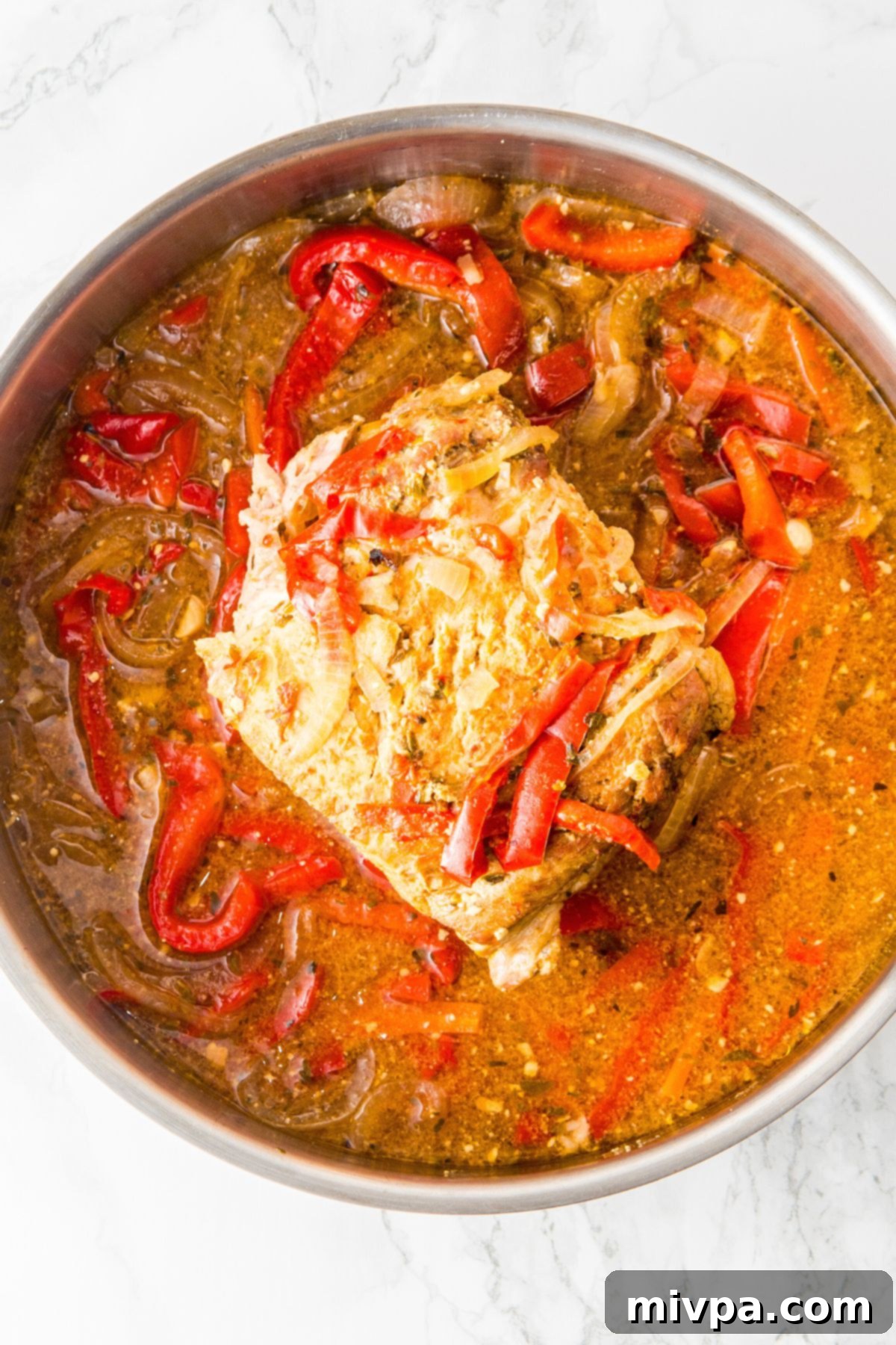 Gluten-Free Dairy-Free Pulled Pork Cooking pork shoulder and veggies in broth.