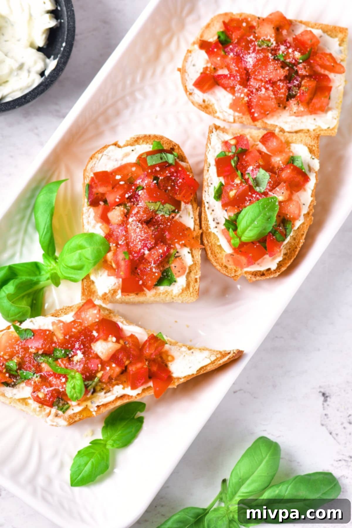 Easy Gluten-Free Bruschetta Bread (Vegan) Gluten-free bruchetta bread on serving platter.