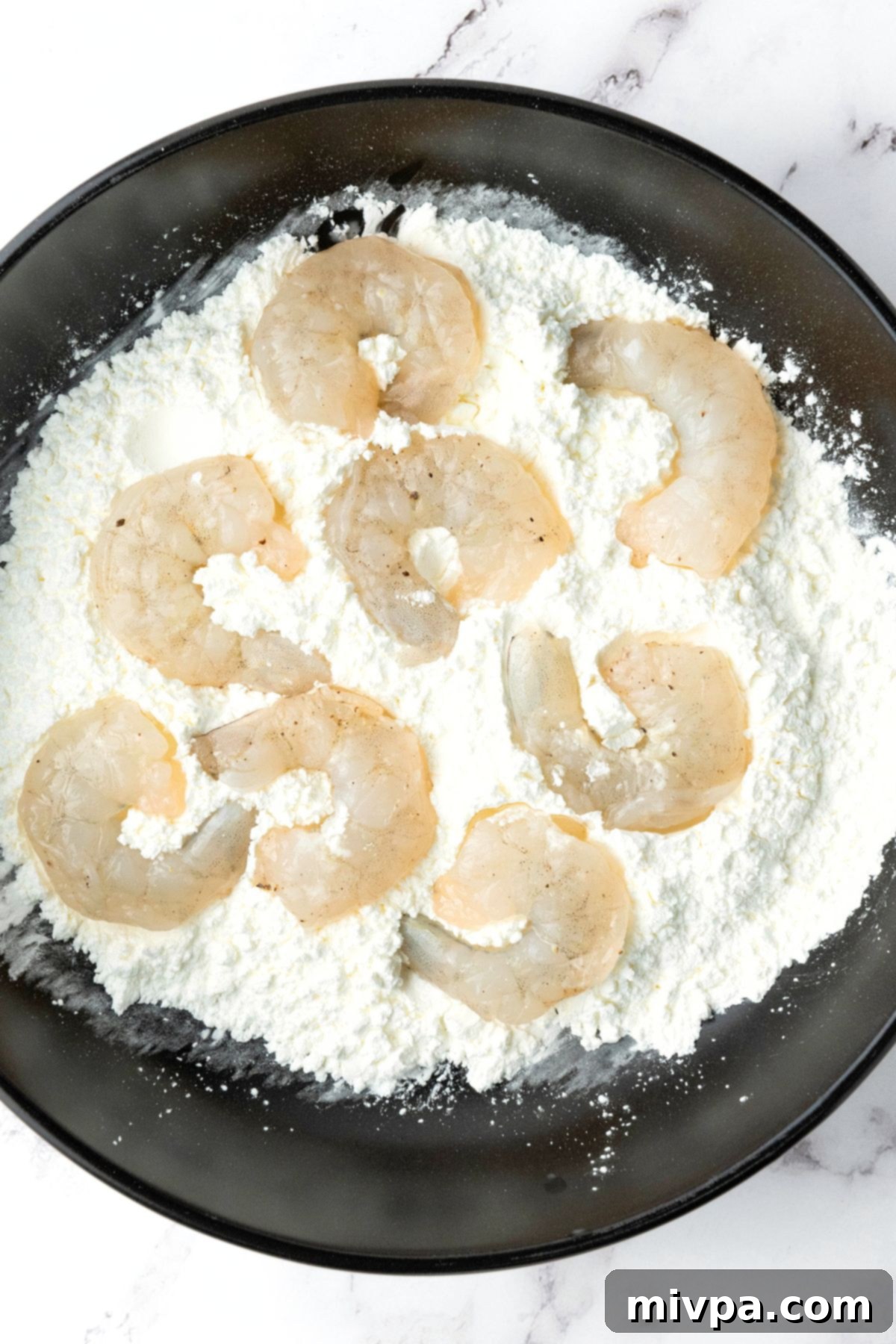 Bang Bang Shrimp Recipe (Gluten-Free, Dairy-Free) Coating shrimp in cornstarch