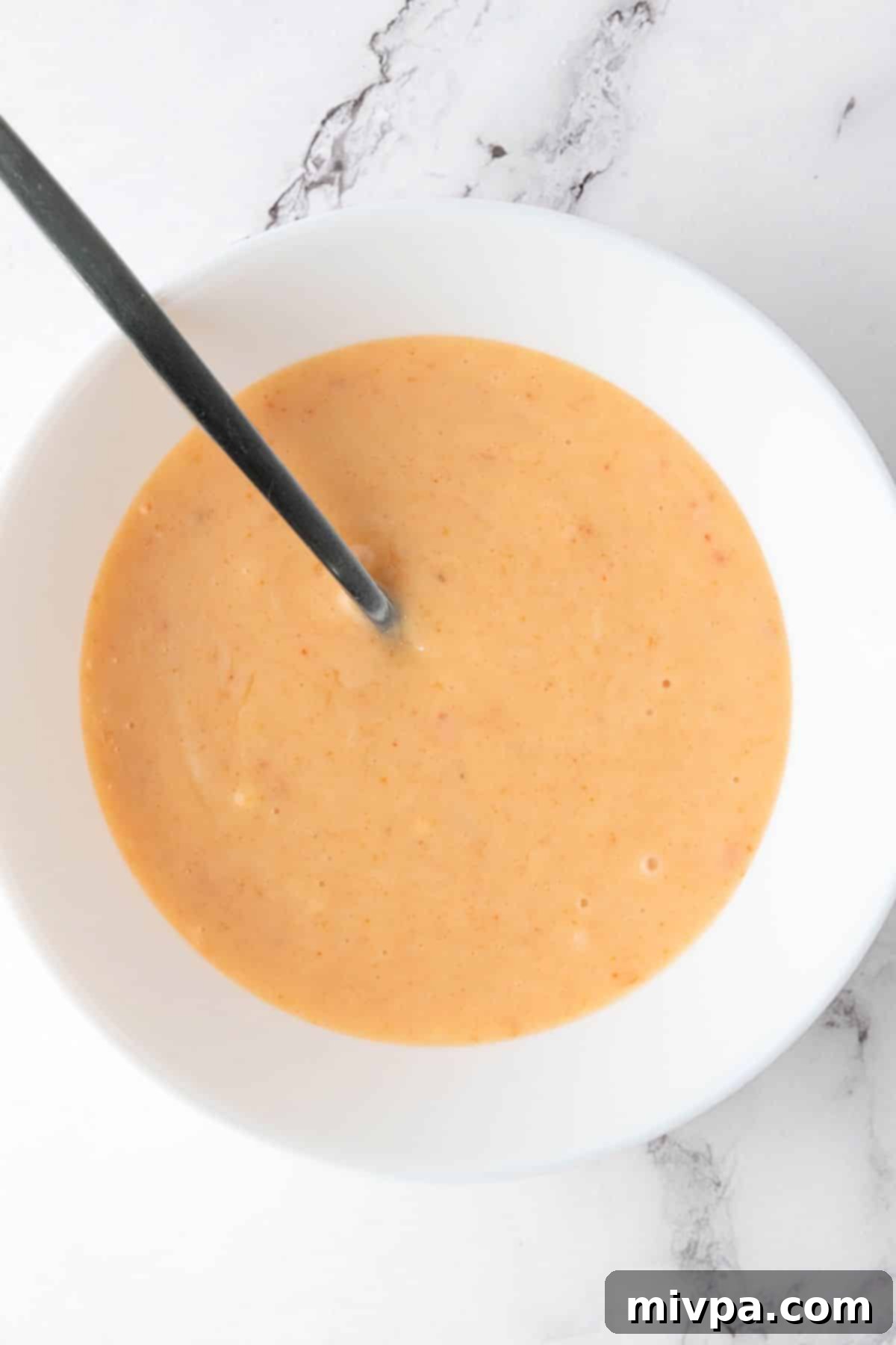 Easy Bang Bang Sauce (Gluten-Free, Dairy-Free) A bowl of bang bang sauce