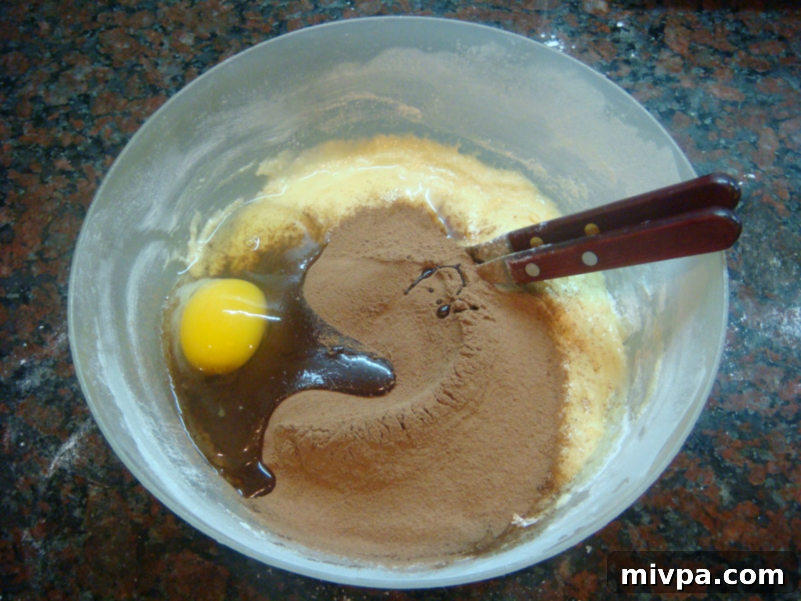 Chocolate Cherry Muffins 10 Unsweetened cocoa powder and the final egg being added to the muffin batter.