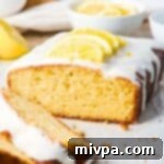 Gluten-Free Dairy-Free Lemon Drizzle Cake 2 Half-eaten loaf of gluten-free lemon drizzle cake.
