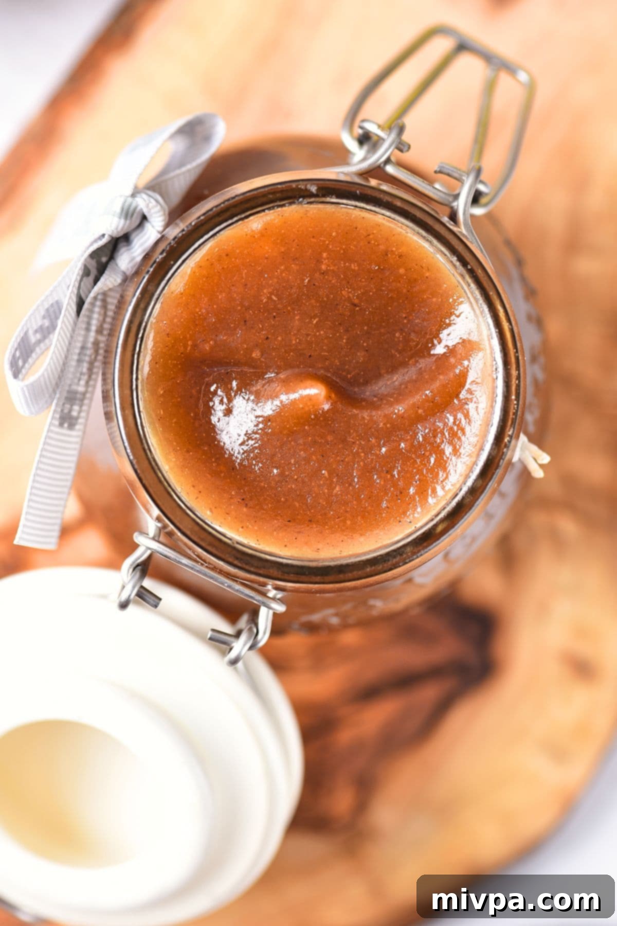 Top down view of a jar of homemade apple butter