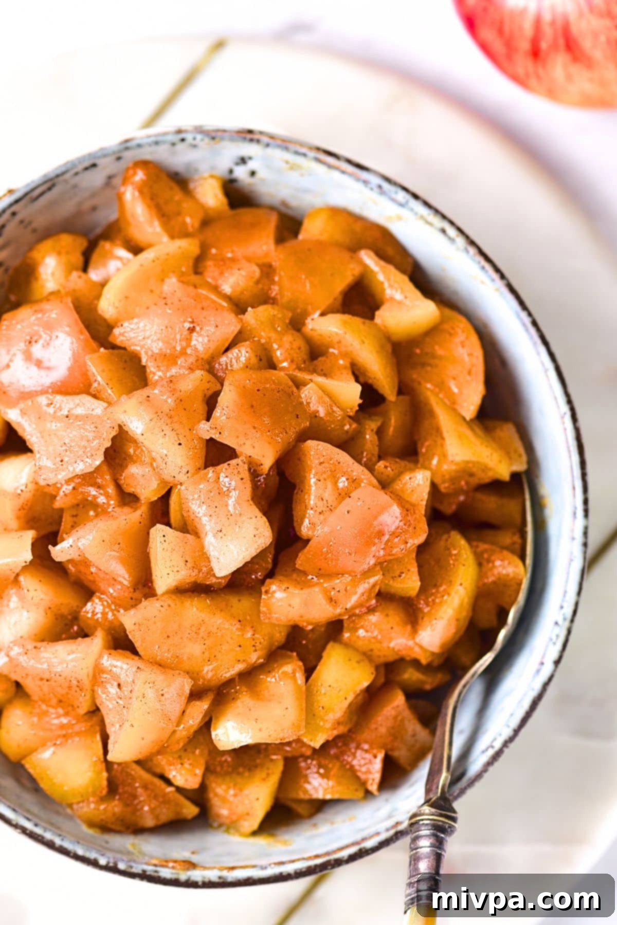 Recipe for Caramelized Apples (Gluten-Free, Vegan) Top down view of a bowl of caramelized apples