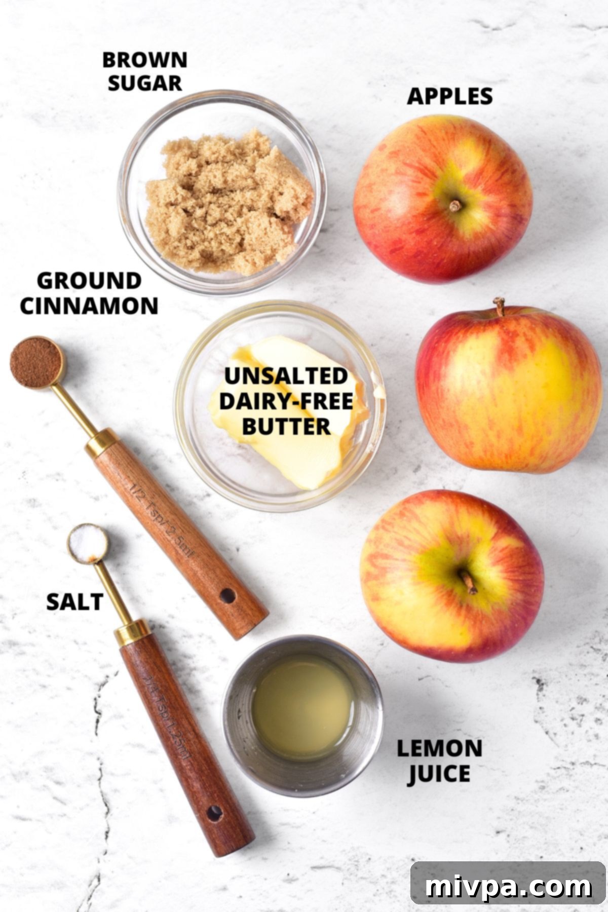 Easy Caramelized Apples Recipe (Gluten-Free, Vegan) Ingredients for caramelized apples recipe laid out on marble board.