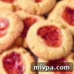 Effortless Gluten-Free Dairy-Free Jam Thumbprints 3 A small image of a gluten-free thumbprint cookie from the recipe card.