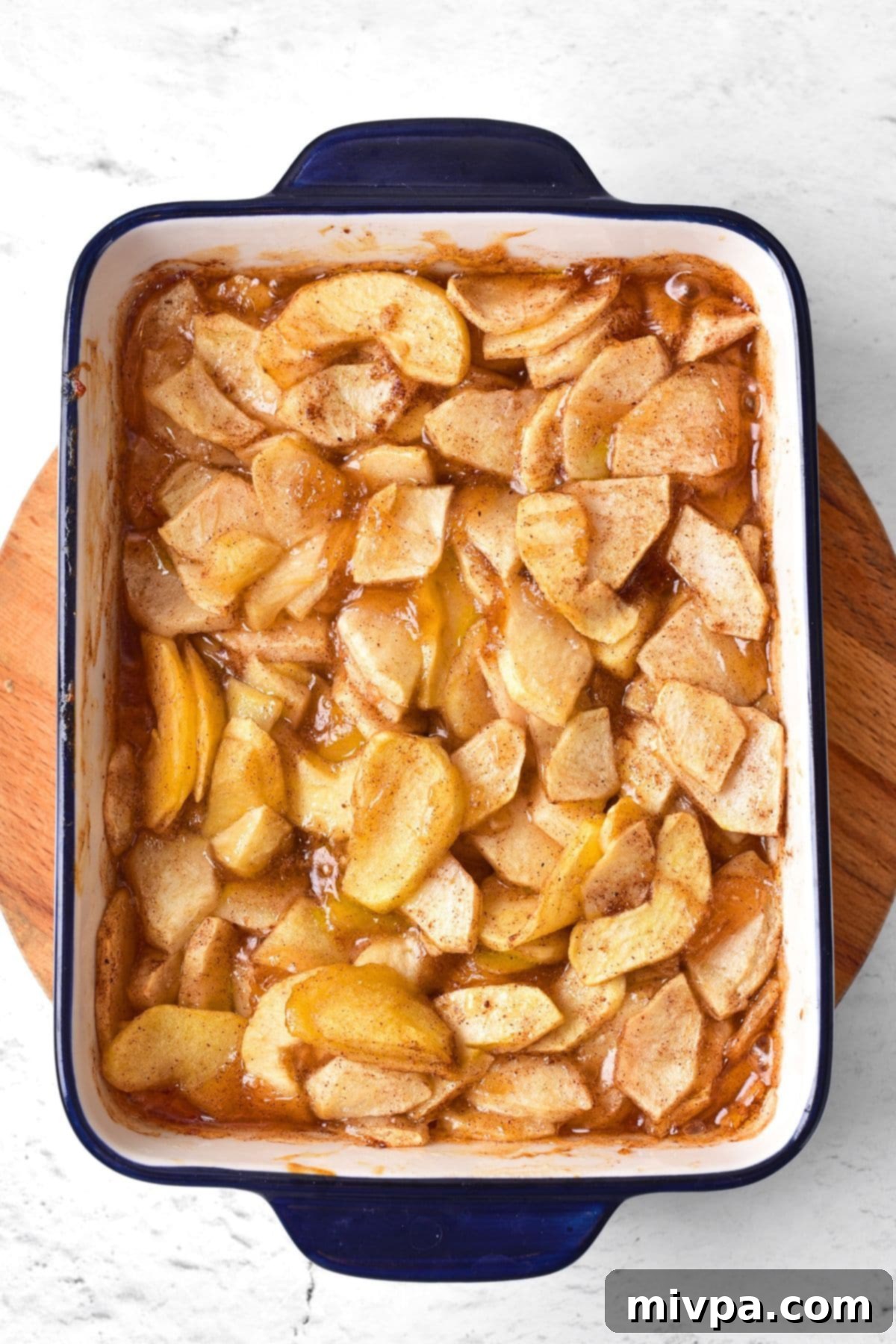 Freshly baked apples in baking dish