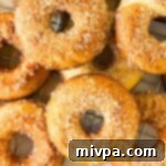 Gluten-free apple cider donuts on wire rack