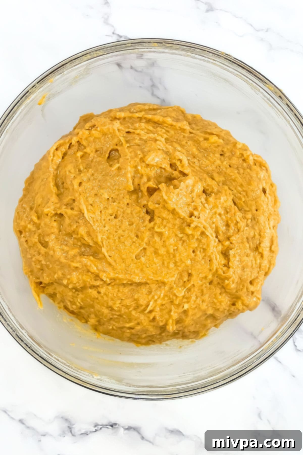 Pumpkin batter in glass bowl