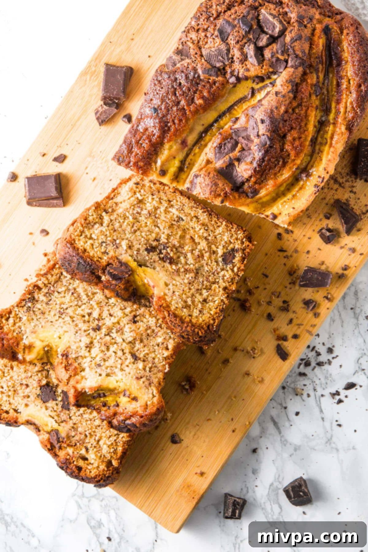 Sliced loaf of banana chocolate chip bread