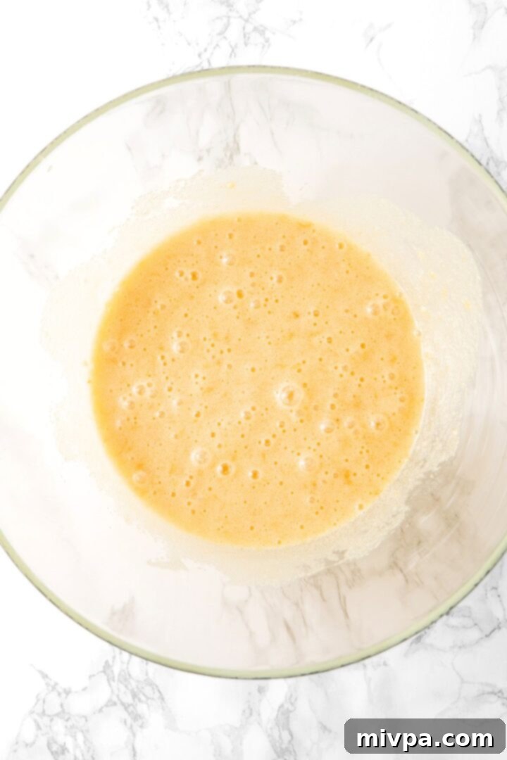 A bowl with pale yellow batter