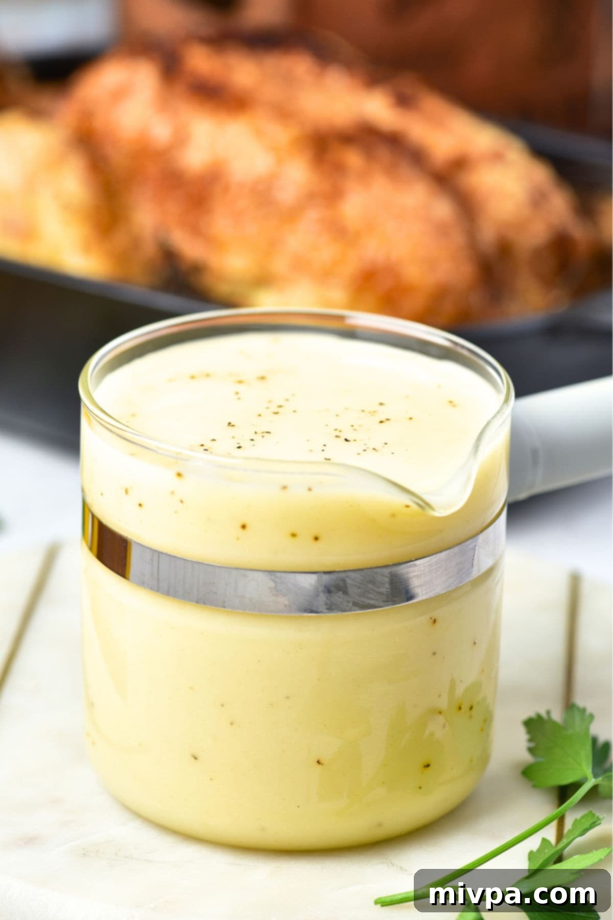 Up close shot of a jar of gluten-free chicken gravy.