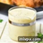 Chicken gravy in glass jar