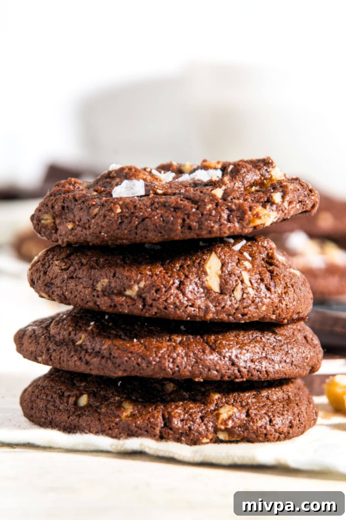 Stack of Walnut Chocolate Cookies (Gluten-Free, Dairy-Free) A beautifully stacked tower of freshly baked walnut chocolate cookies, ready to be enjoyed.