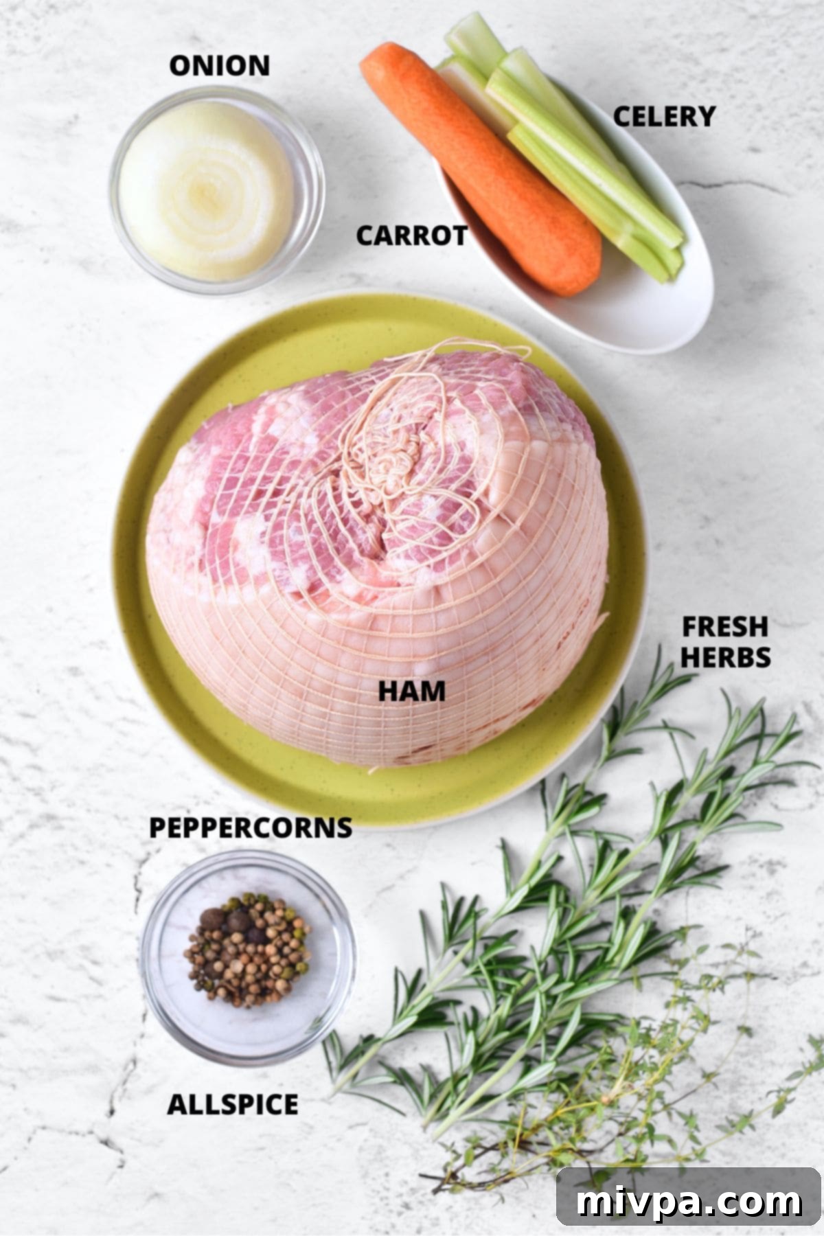 Ingredients for slow cooker ham recipe on marble board