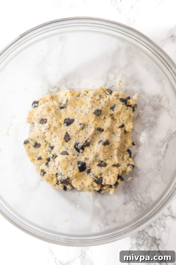 Olive almond flour crackers Olive cracker dough in mixing bowl
