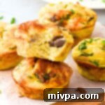 Protein-Packed Gluten-Free Cottage Cheese Egg Bites 2 Half-eaten cottage cheese and egg muffins on board, highlighting the savory breakfast.