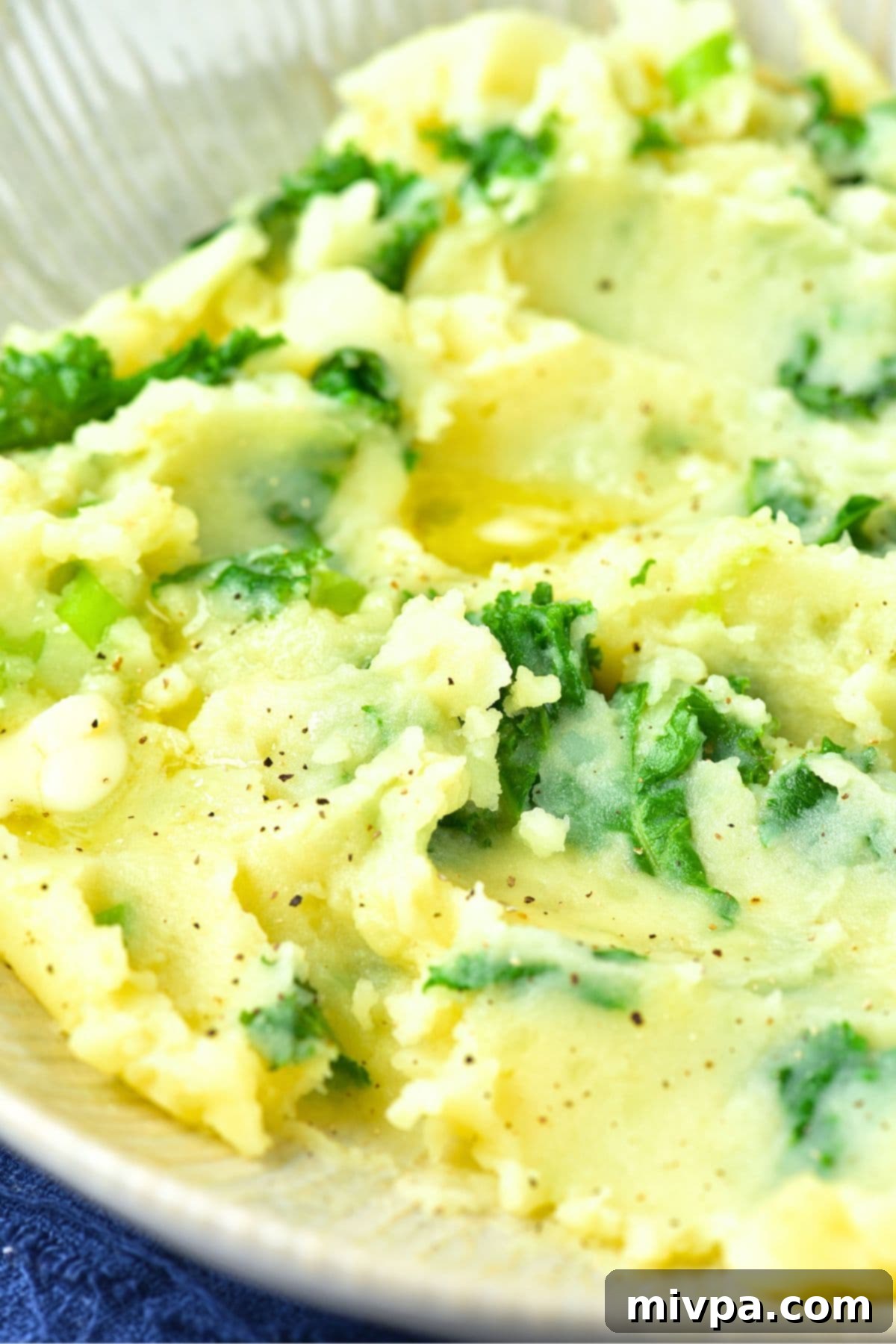 Irish Colcannon Recipe (Gluten-Free, Dairy-Free Option, Perfect Texture) Up close view of incredibly creamy mashed potatoes mixed with vibrant kale, showing the perfect texture