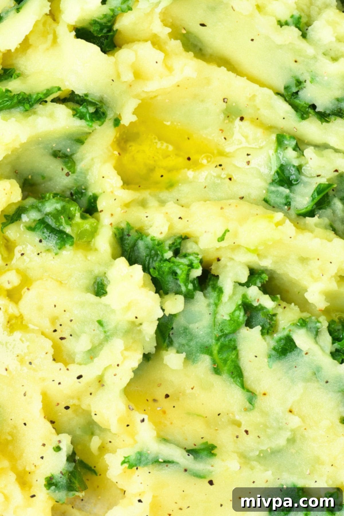 Colcannon with Kale (Gluten-Free, Creamy Texture) Up close view of creamy colcannon texture with visible kale pieces and a hint of butter