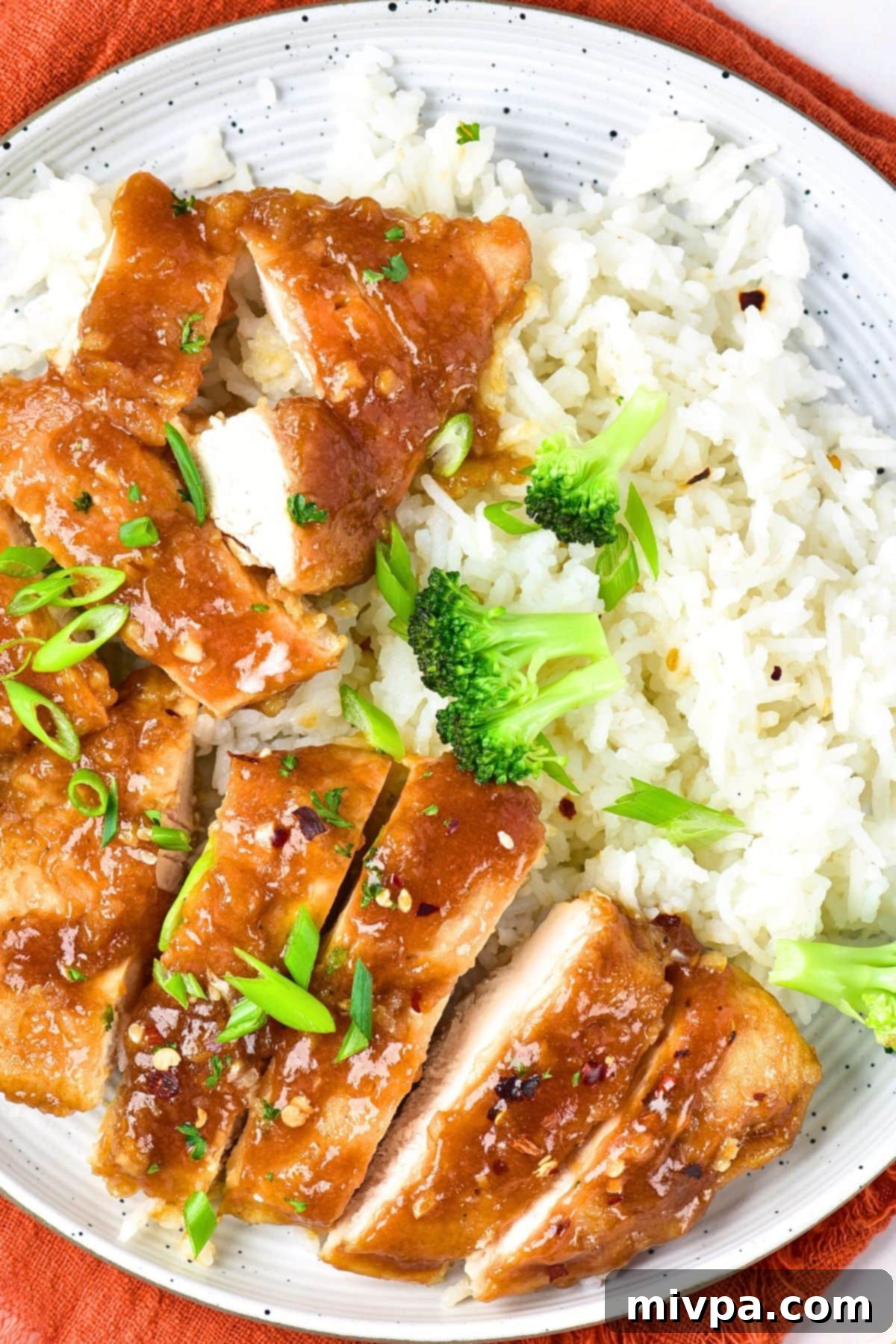 Gluten-Free Honey Soy Chicken A plate of perfectly garnished gluten-free honey soy chicken, ready to eat.