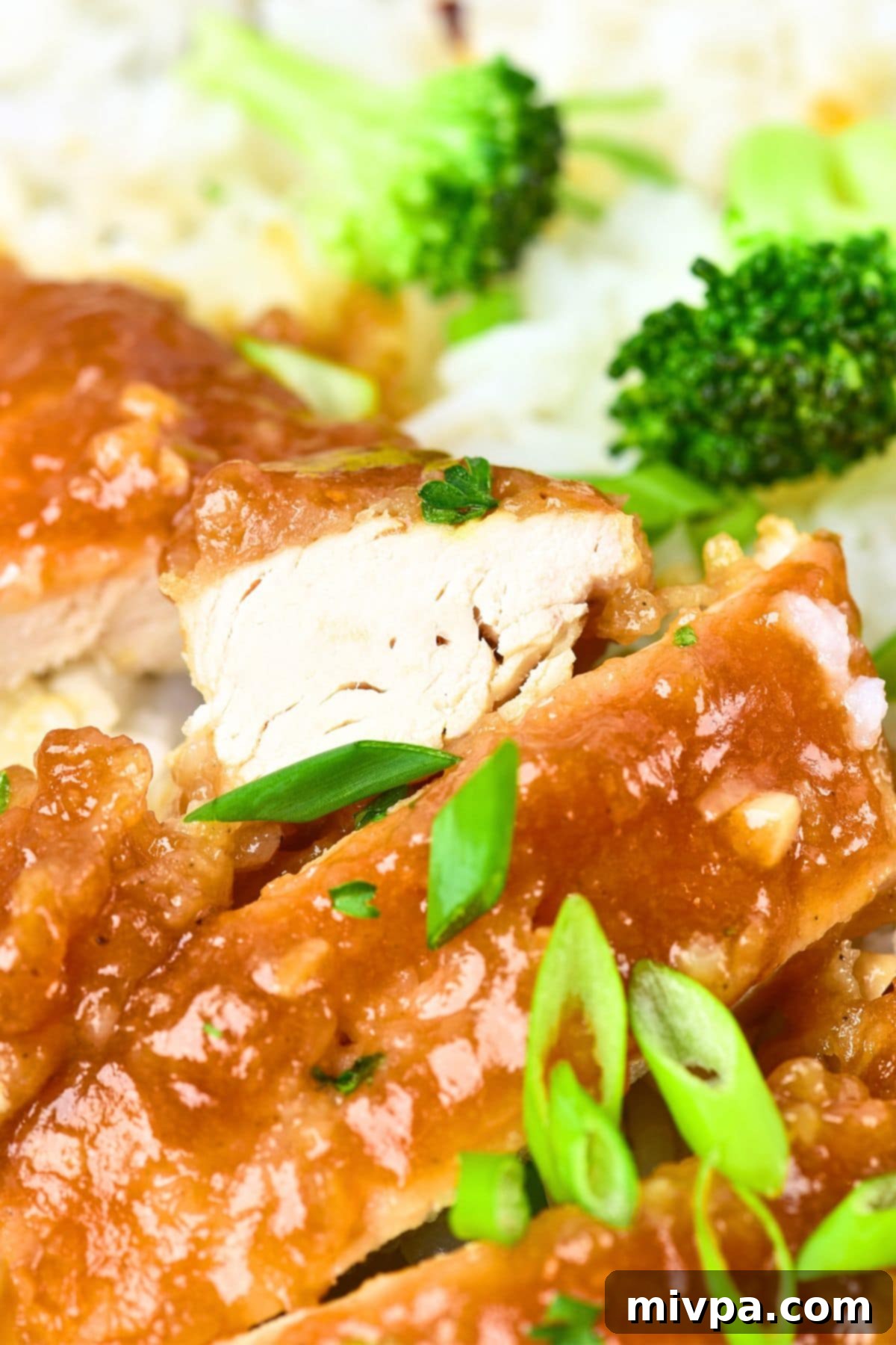 Easy Honey Garlic Chicken (Gluten-Free, Dairy-Free) Up close view of honey garlic soy chicken, emphasizing the glossy sauce.
