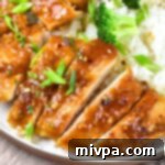 Effortless Allergy-Friendly Honey Garlic Chicken 2 A plate of honey garlic chicken and rice, ready to be served.
