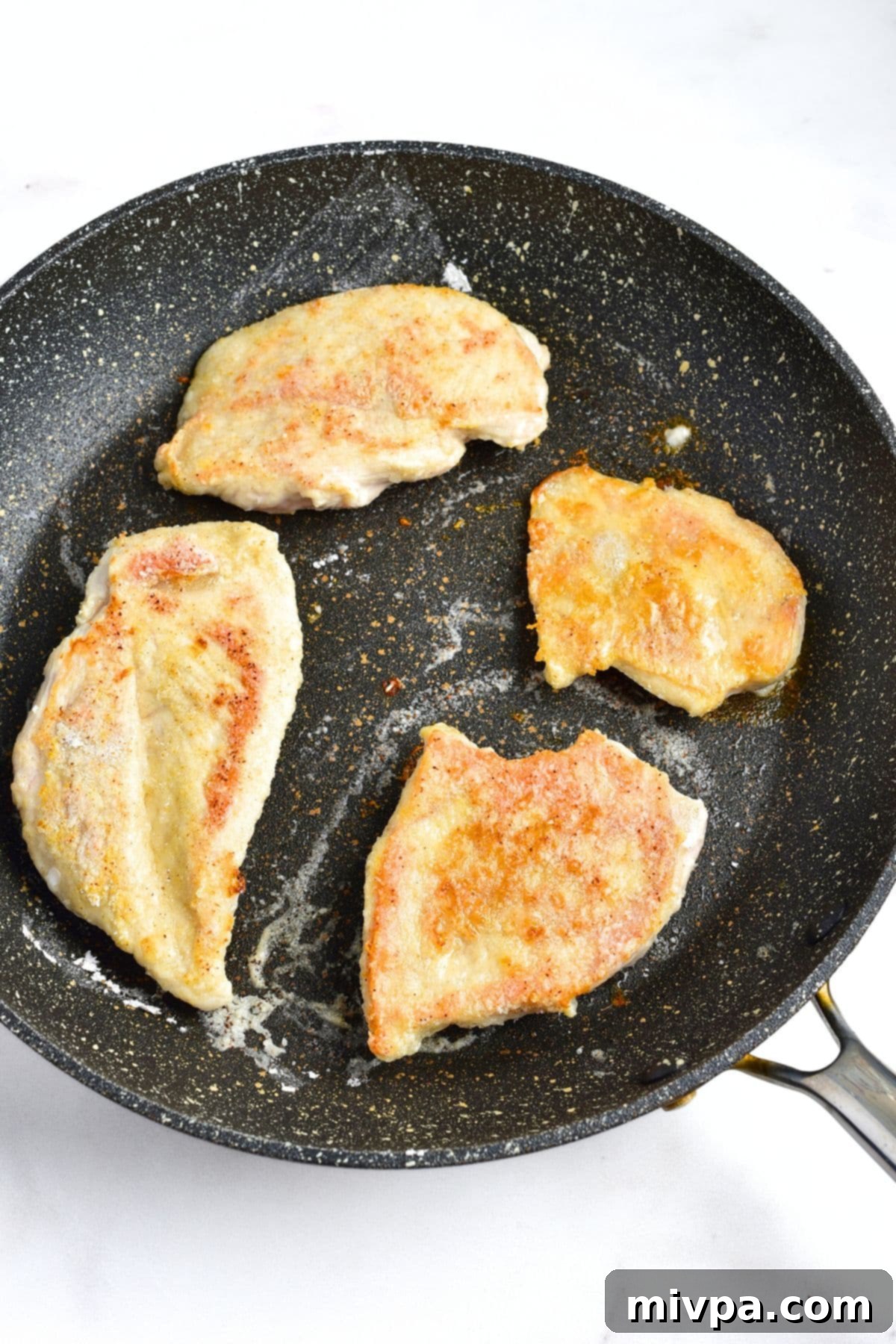 Gluten Dairy-Free Honey Garlic Chicken Pan-Frying Chicken Fillets until golden brown and cooked through.