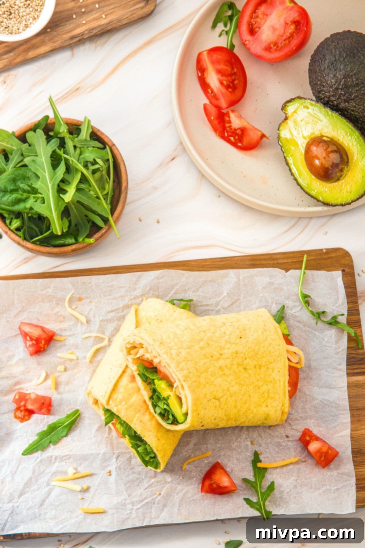 Healthy Cottage Cheese Flatbread 2 Sliced veggie wrap on parchment-lined wooden board.