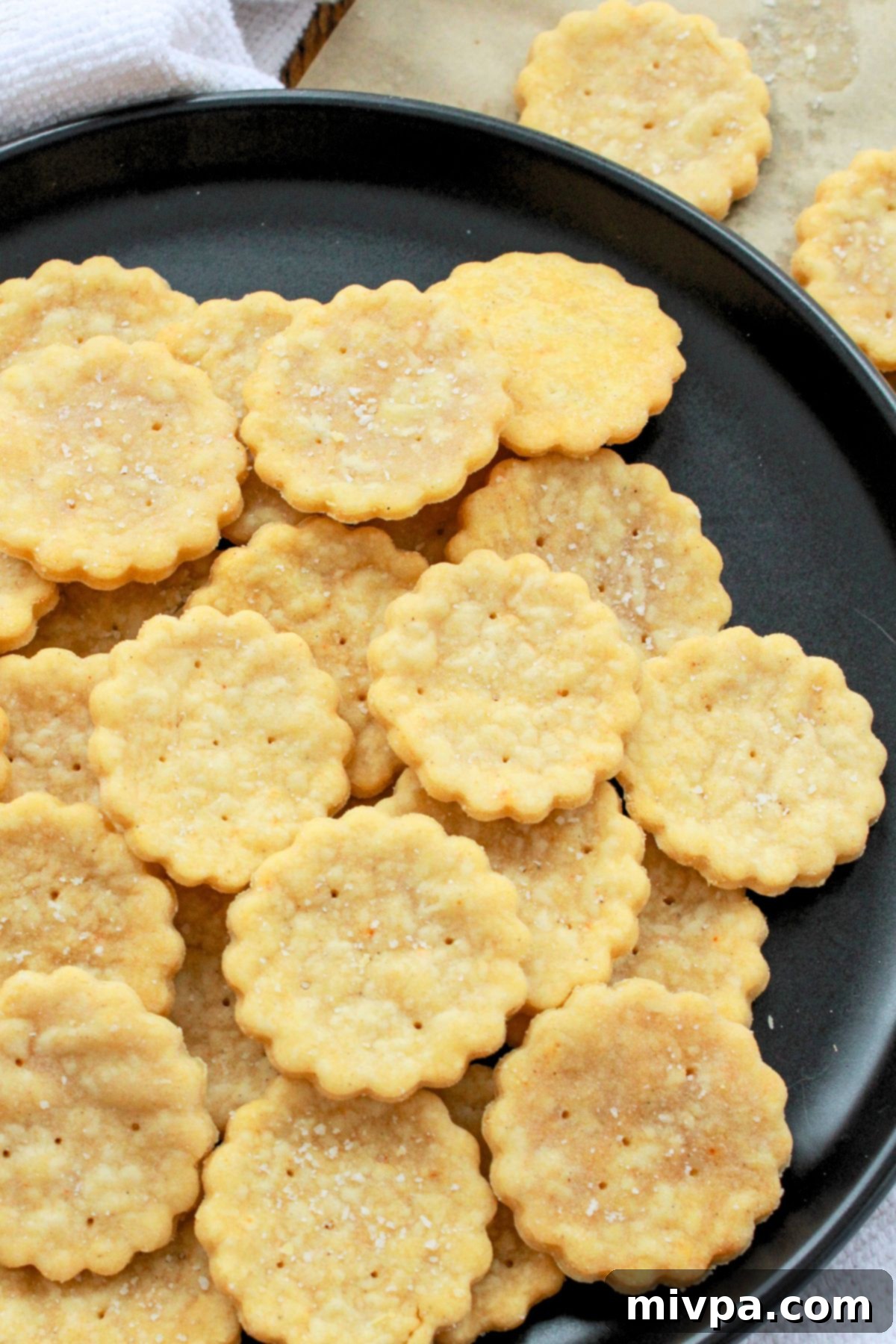 Homemade Gluten-Free Ritz Crackers (Dairy-Free Option) A plate of gluten-free homemade ritz crackers