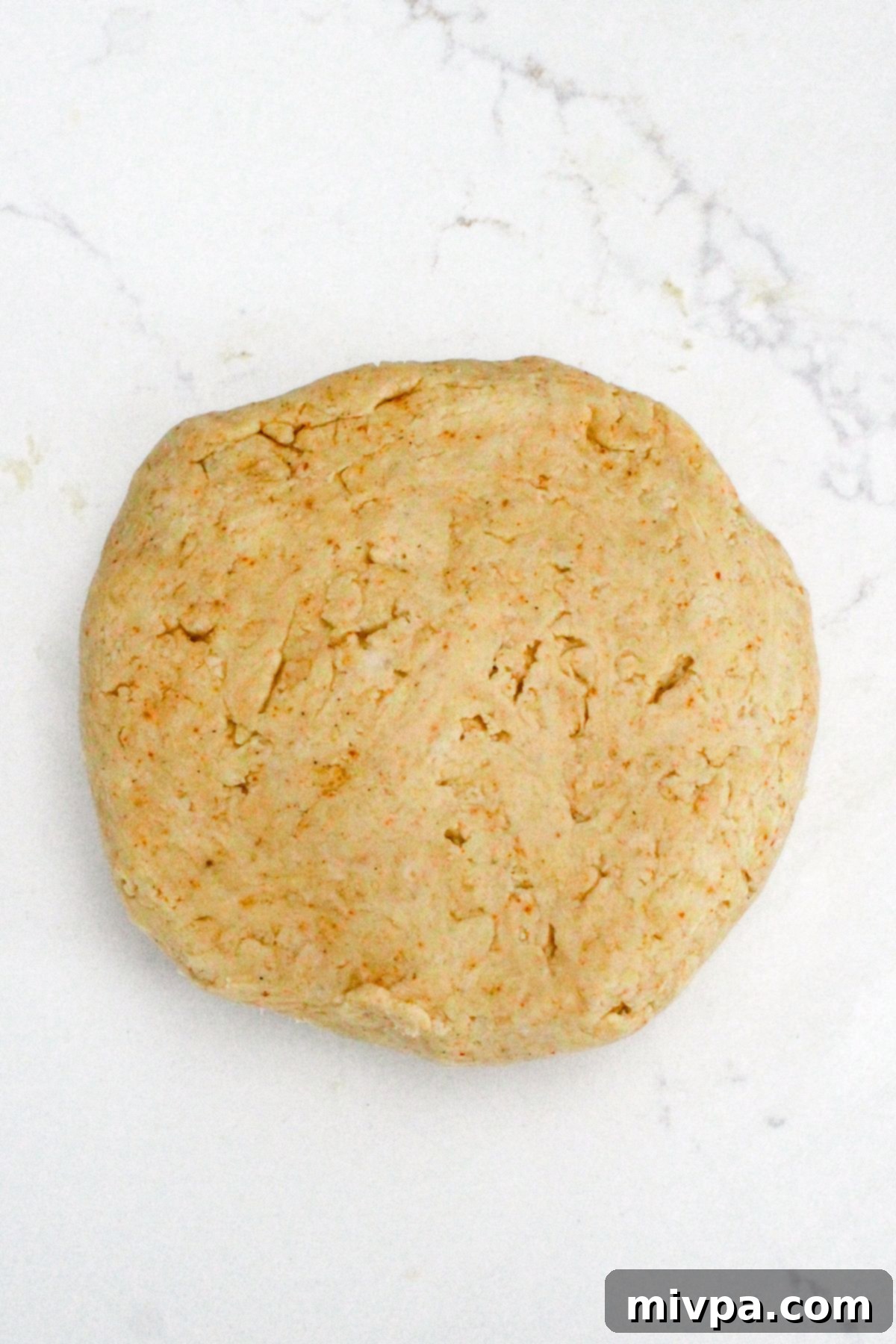 Gluten-Free Ritz Style Crackers Recipe A round disc of cracker dough