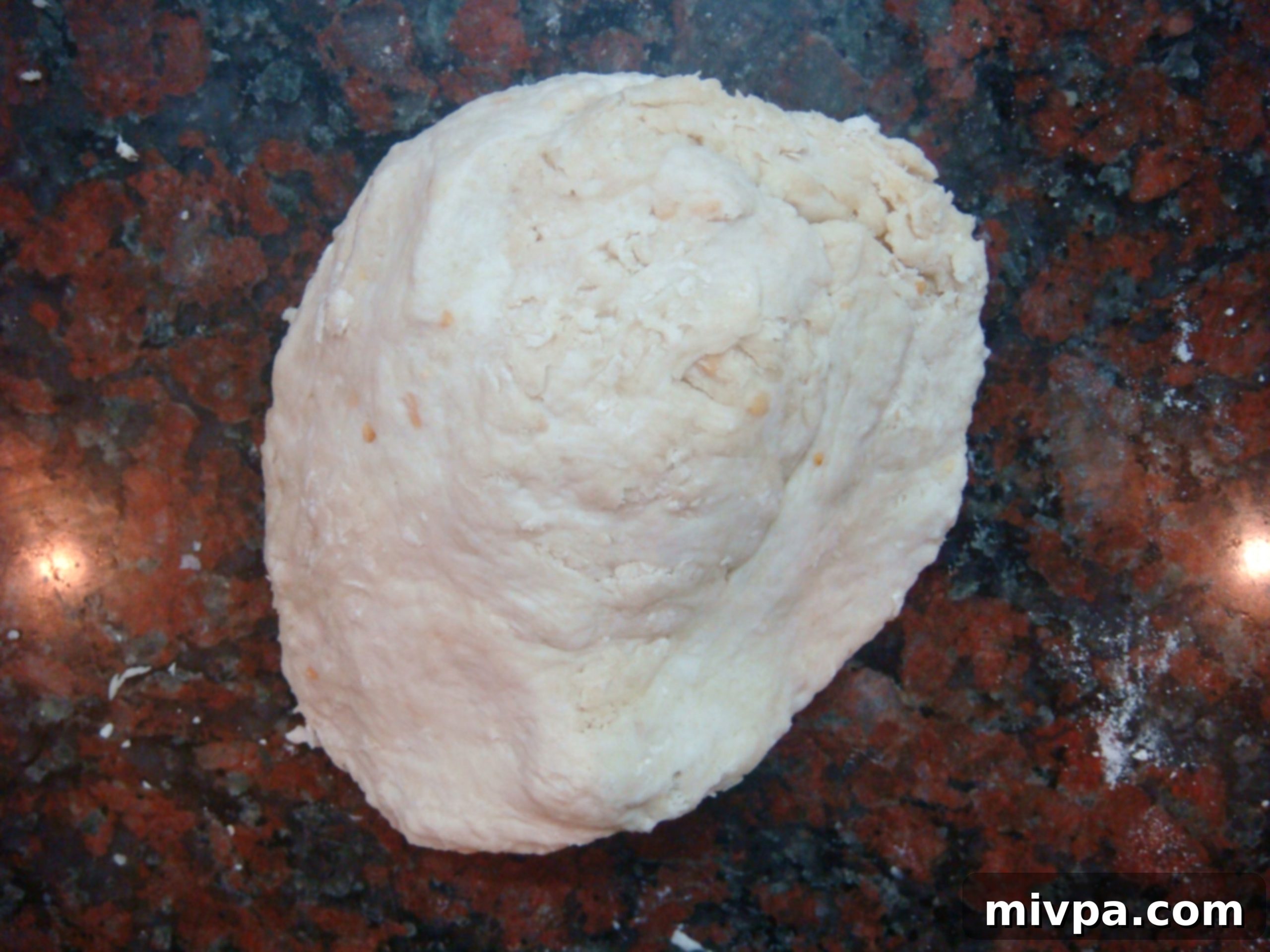 DSC07022 - Kneading cracker dough on a flat surface