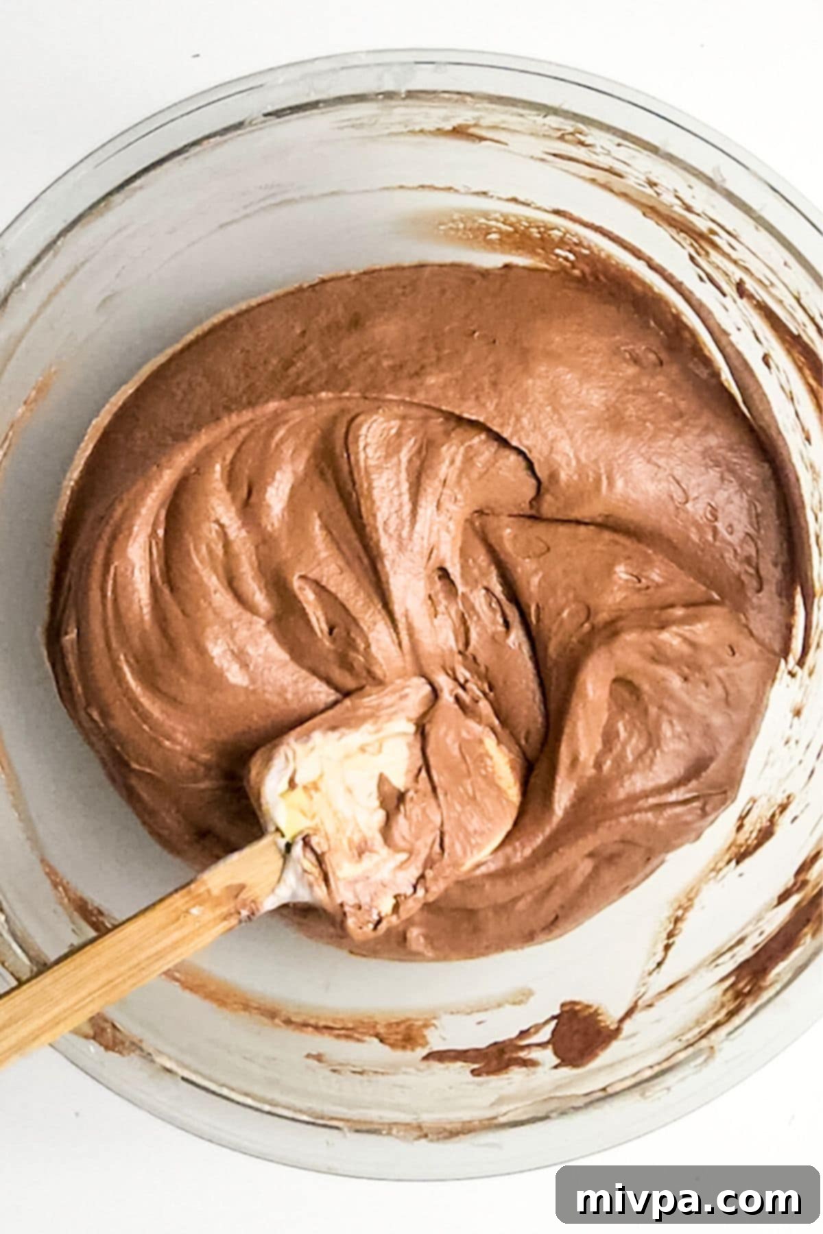 Spatula in bowl of chocolate mousse