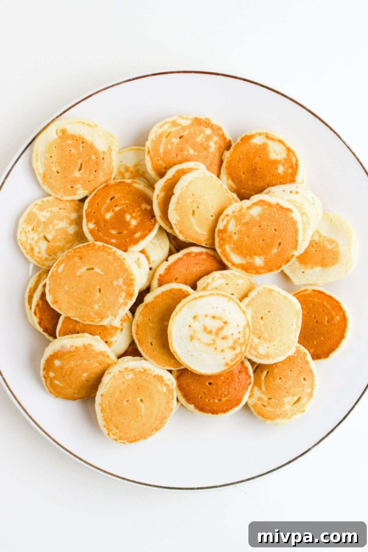A plate of gluten-free dairy-free mini pancakes