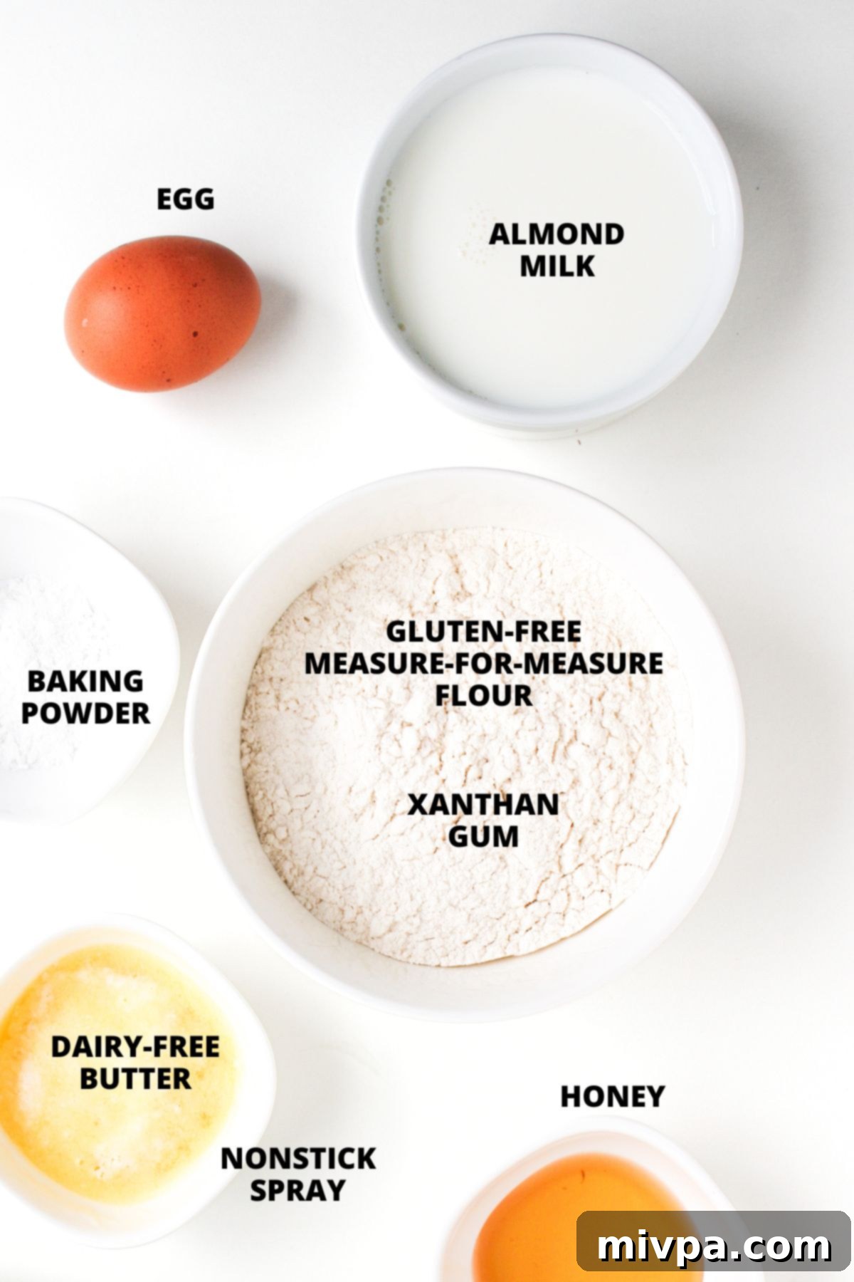 Ingredients for gluten-free mini pancakes recipe laid out on white board