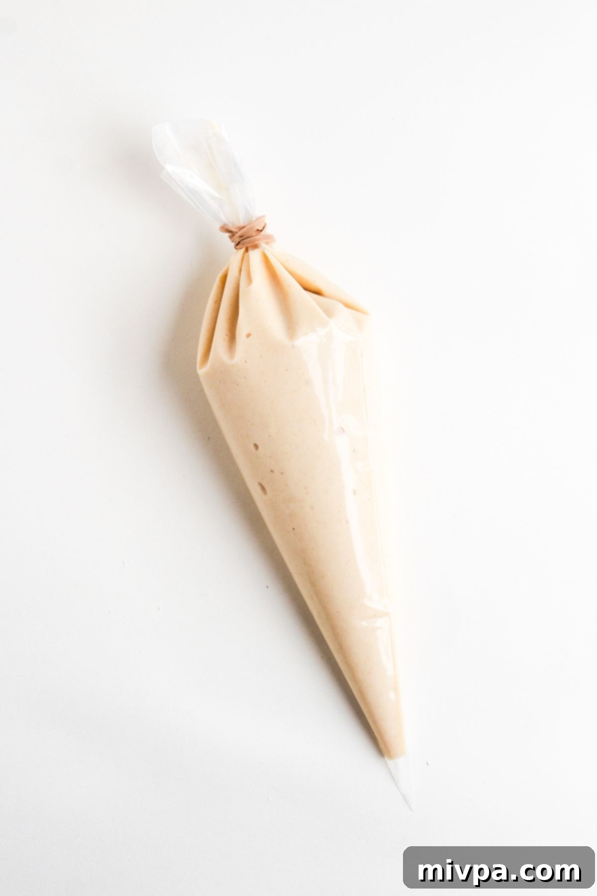 Pancake batter in piping bag