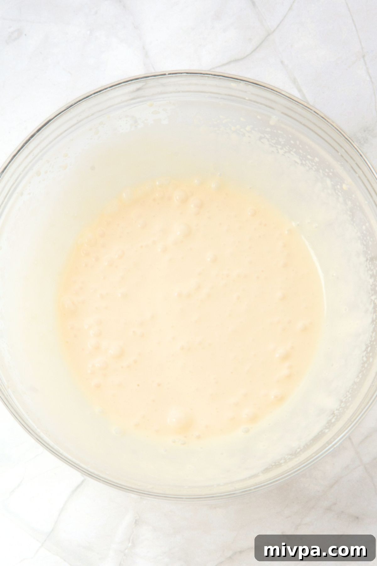 Mini Strawberry Cheesecake Cups (Gluten-Free, No-Bake) Cream mixture in glass bowl