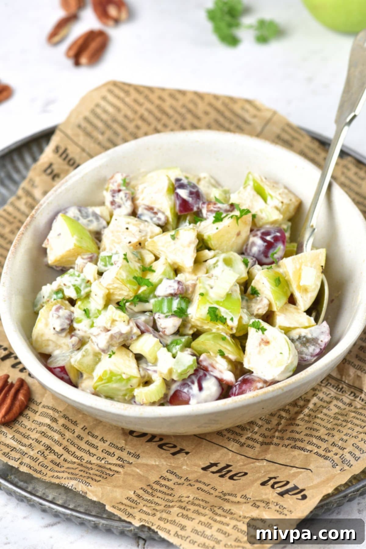 Vegan Waldorf Salad Recipe A bowl of vegan waldorf salad with grapes, chicken and celery