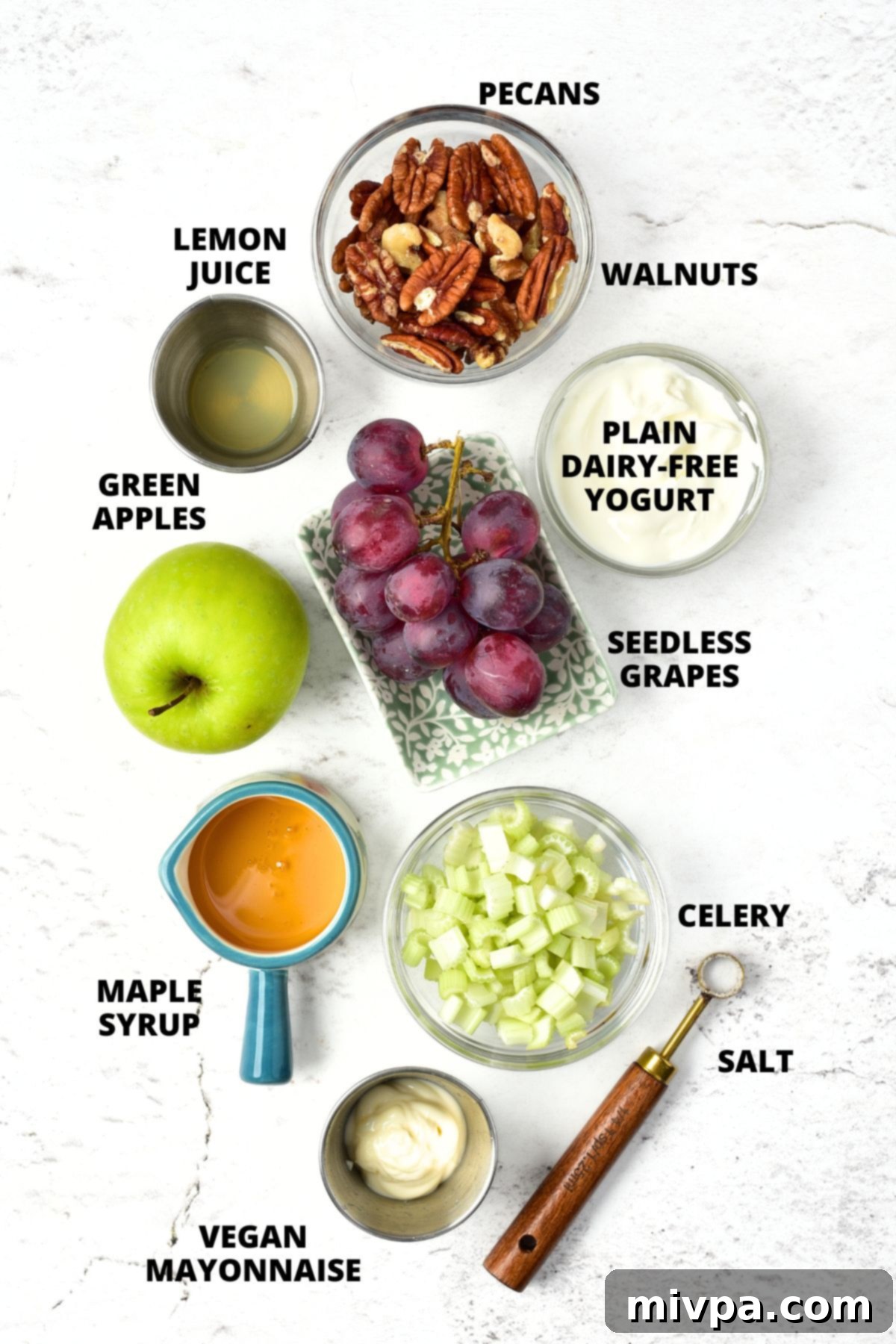 Vegan Waldorf Salad Recipe Ingredients for vegan waldorf salad recipe laid out on white board