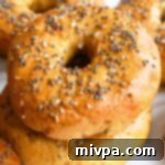 Perfectly Chewy Tender Gluten-Free Vegan Bagels 2 A stack of gluten-free everything bagels
