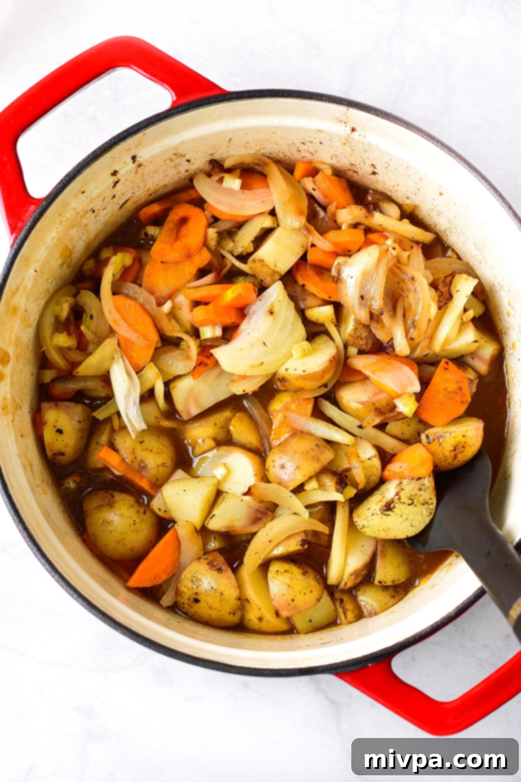 Easy Gluten Free Beef Stew (Dairy-Free) GF Beef stew ingredients in Dutch oven.