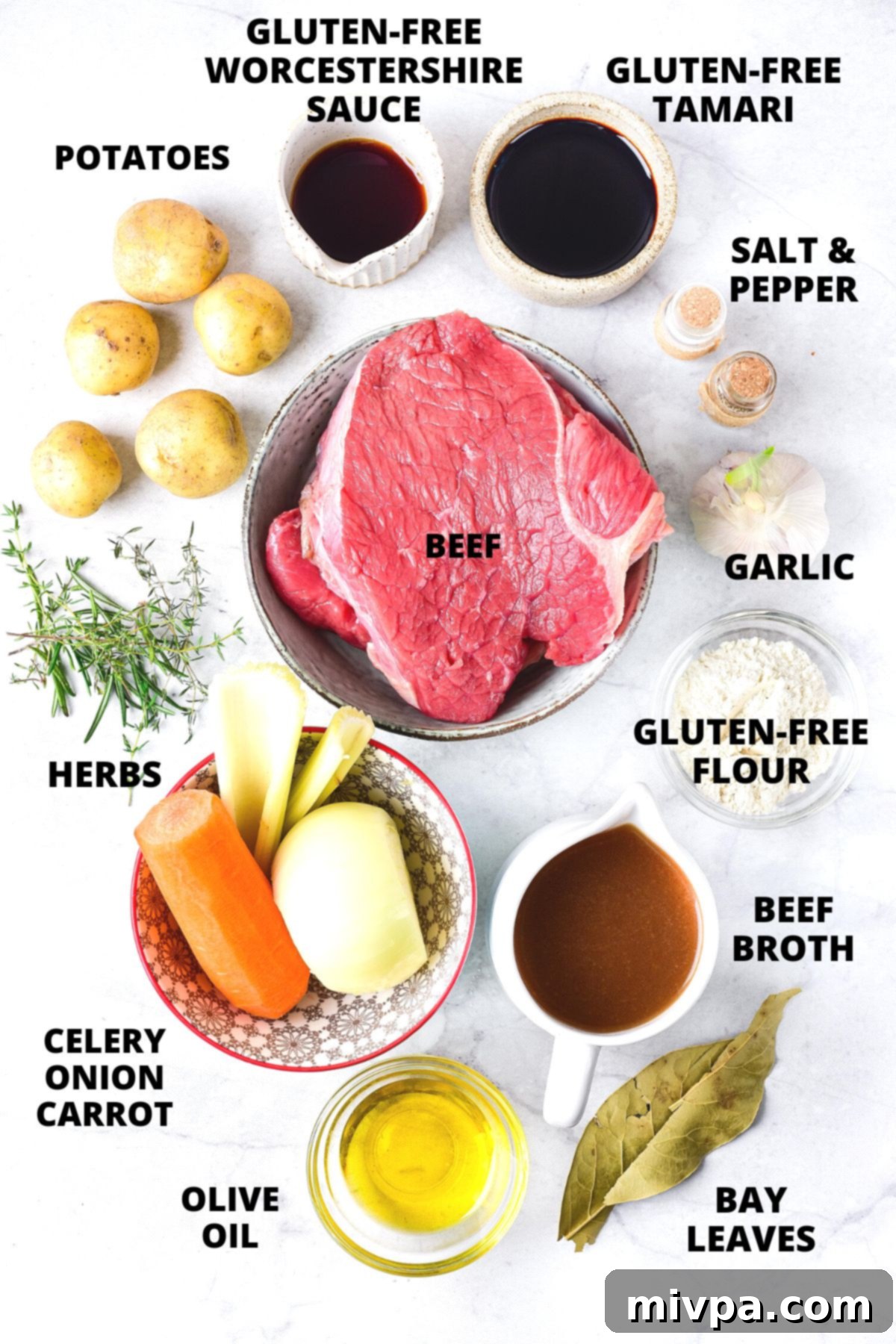Gluten Free Beef Stew Recipe (Dairy-Free) Ingredients required for gluten-free beef stew recipe laid out on white board.
